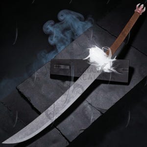 May include: A curved sword with a dark, patterned blade and a brown handle featuring a light-colored pommel. A tuft of white fur is attached to the base of the blade near the brown grip, and the sword rests against a black rectangular scabbard.