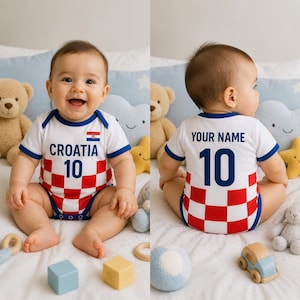 May include: A white baby bodysuit with blue trim and a red and white checkered pattern. The front displays "CROATIA 10" with the Croatian flag. The back has "YOUR NAME" and "10".