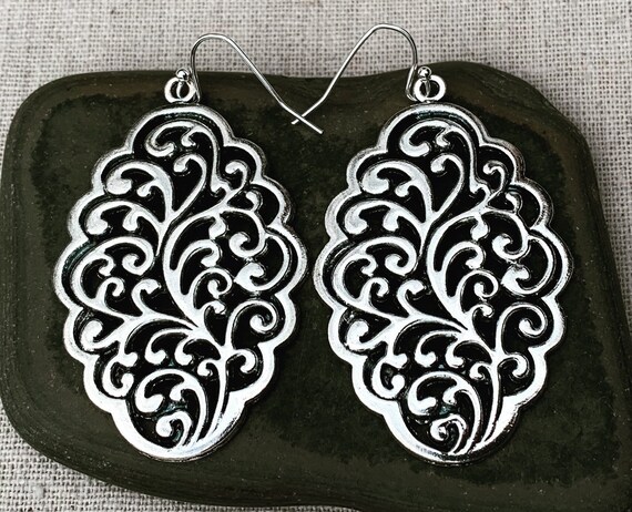 Big earrings for best sale sale