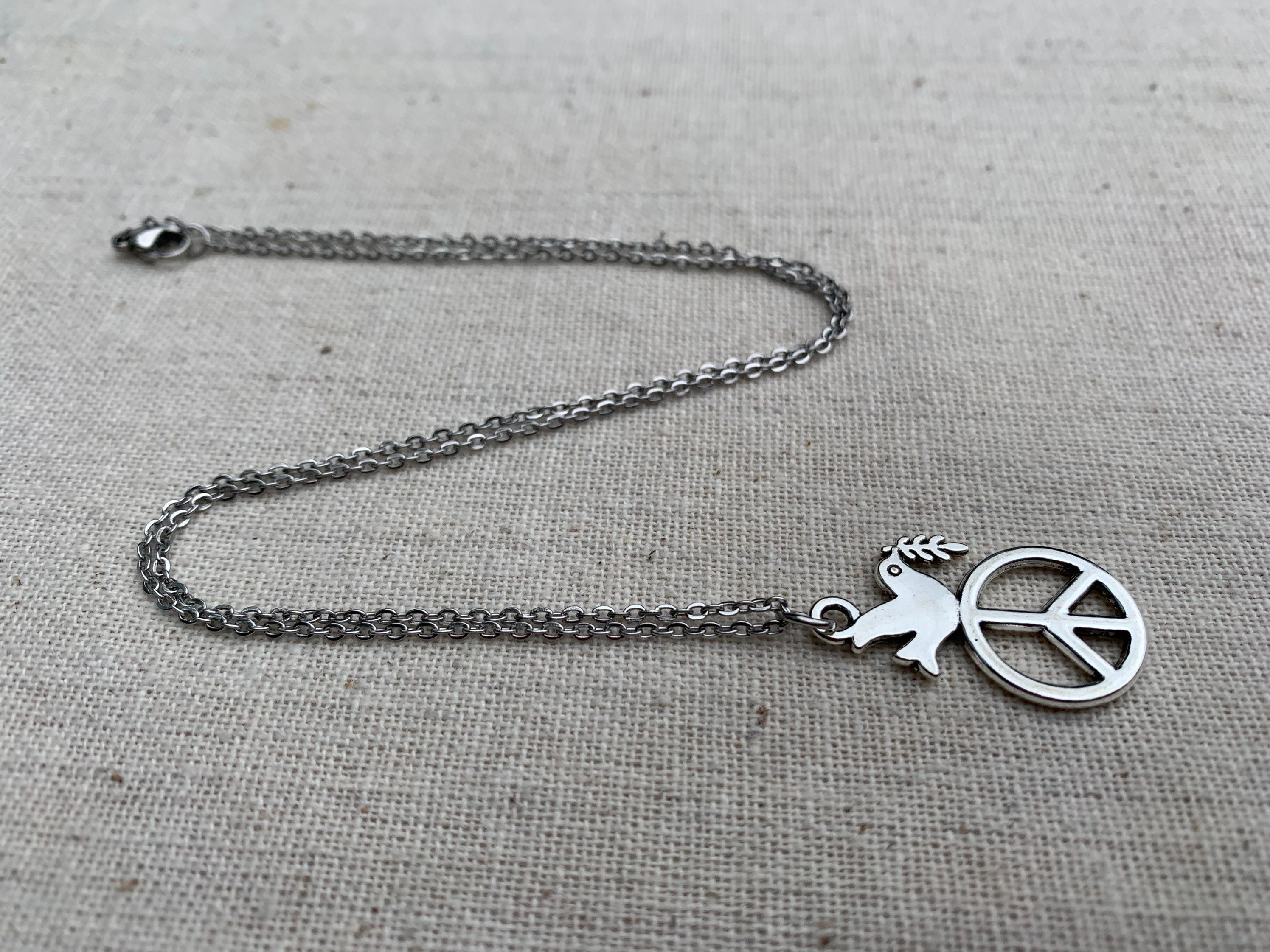AeraVida Sterling Silver Dove Pendant Necklace – Olive Leaf Design, 18" Cable Chain, Peace Bird Jewelry, Gift Ready