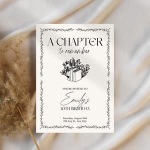 May include: A cream-colored invitation with black text and a floral border. The text reads "A Chapter to Remember" and "You're Invited to Emily's 30th Birthday." Includes date and address details.