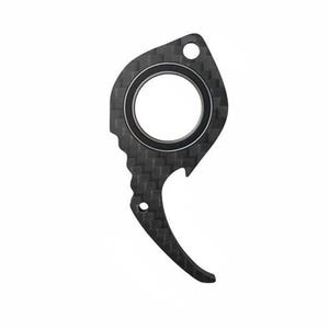 May include: A black, multi-tool keychain with a textured carbon fiber pattern. The tool has a circular opening in the center, a bottle opener, and a curved end. It features a small hole for attaching to a keychain.