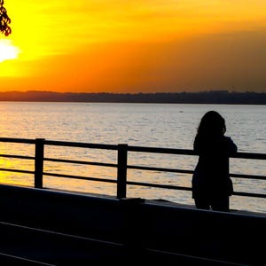 Encarnacion Sunset: Bohemia Over the Parana