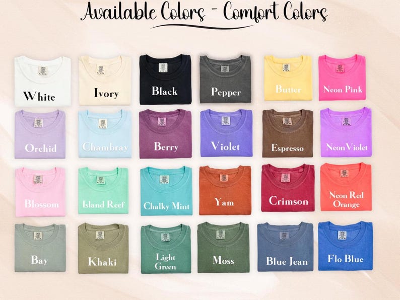 May include: A color chart displaying twenty-four t-shirts in various shades labeled Available Colors - Comfort Colors. The colors include white, ivory, black, pepper, butter, neon pink, orchid, chambray, berry, violet, espresso, neon violet, blossom, island reef, chalky mint, yam, crimson, neon red orange, bay, khaki, light green, moss, blue jean, and flo blue.