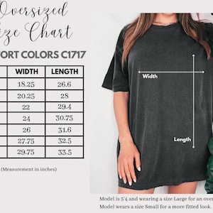 May include: An oversized Comfort Colors C1717 t-shirt size chart with columns for size, width, and length in inches. The chart lists sizes S through 4XL with corresponding measurements. A black t-shirt is shown with white lines indicating width and length.