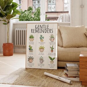 Puede incluir: Un p&oacute;ster enmarcado con las palabras "GENTLE REMINDERS" en la parte superior. El p&oacute;ster presenta ilustraciones de plantas en macetas con afirmaciones positivas como "Tus sentimientos son v&aacute;lidos" y "Est&aacute; bien descansar y hacer una pausa."