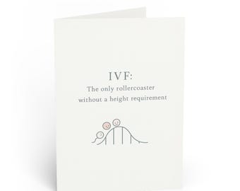 May include: A folded greeting card with the text "IVF: The only rollercoaster without a height requirement." A simple illustration of a rollercoaster with three pink circles representing riders.