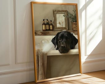 May include: A framed mirror with a golden frame, reflecting a black dog in a bathtub. The dog's head rests on the tub's edge, with bubbles and a towel visible. The mirror also reflects bottles and a framed picture.