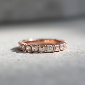 Emerald Cut Moissanite Eternity Band: 14K Rose Gold Plated Sterling Silver