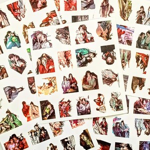 May include: A selection of stickers displaying anime-style illustrations of characters in vibrant attire. The stickers are scattered on a white background, presenting diverse poses and scenes. The artwork includes detailed depictions of clothing and expressions.