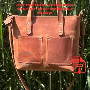 May include: A brown leather tote bag with two front pockets and a shoulder strap. The bag has a top handle and is decorated with rivets. Text on the image reads "PDF PATTERN, DRAWINGS, STEP-BY-STEP ASSEMBLY GUIDE."