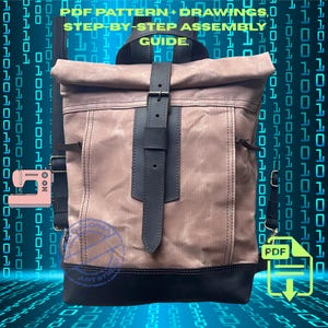 May include: A tan roll-top backpack with a dark brown leather base and a central vertical leather strap featuring a metal buckle. The bag includes adjustable shoulder straps and side attachments. Text reads: PDF PATTERN + DRAWINGS, STEP-BY-STEP ASSEMBLY GUIDE.