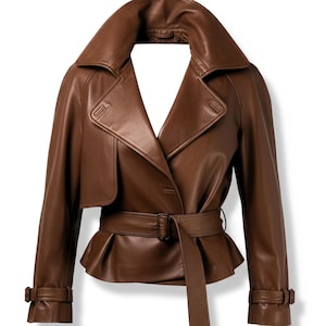 May include: A brown leather jacket with a wide collar, belted waist, and button closure. The jacket features a peplum hem and adjustable cuffs. This stylish outerwear is perfect for adding a touch of sophistication to any outfit.