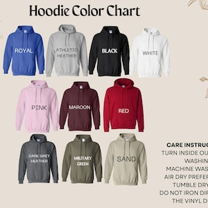 May include: A hoodie color chart displaying eleven hooded sweatshirts in royal blue, athletic heather, black, white, pink, maroon, red, dark grey heather, military green, and sand. Text includes color names and care instructions for washing.