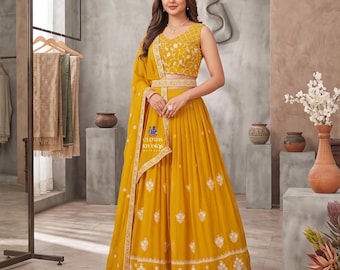 Gele lehenga-choli voor dames: Haldi-outfit Indiase bruiloft, trending Chaniya Cholis