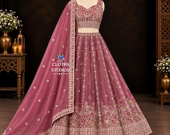 Mauve roze trouwoutfit: Georgette Lehenga Choli met borduurwerk voor Sangeet- en huwelijksfeesten.