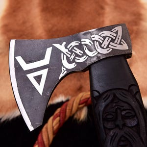 Hand-Forged Viking Axe with Carved Norse Face & Celtic Knot Engraving | Bearded Axe for Display, Cosplay and Gifting