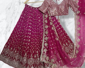 Różowa haftowana lehenga choli: indyjski strój ślubny