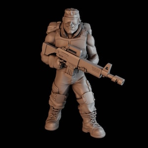 May include: A 3D-printed figurine of a soldier in combat gear, holding a rifle. The figure is in a standing pose, wearing a helmet with goggles, a tactical vest, and combat boots. The color is a neutral gray.