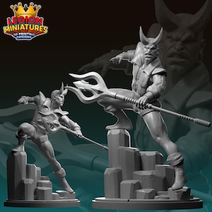 May include: Two gray 3D-printed miniature figures of a horned demon with a trident. The figures are posed on rocky platforms. The Legion Miniatures logo is in the upper left corner, featuring a crown.
