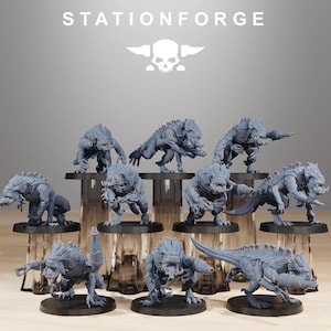 May include: A collection of gray miniature monster figurines, each with a unique pose and design. The figurines are displayed on black bases, with the text "STATIONFORGE" and a skull logo at the top.