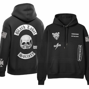 May include: Black hooded sweatshirt with multiple patches and text. The back displays a skull graphic and the words "Black Label Society". The front features the text "Worldwide Black Label Society" and "GLFPD".