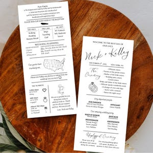 May include: Two white wedding programs with black text are displayed on a wooden surface. The programs list wedding details, including the names Nick and Kelley, the date, and the ceremony schedule. One program includes fun facts about the couple.