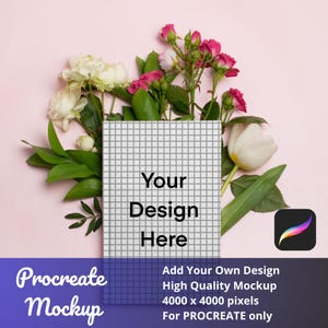 May include: A mockup featuring a notebook with a grid pattern, surrounded by white and pink roses, green leaves, and a white tulip. The notebook displays the text "Your Design Here". The image also includes the text "Procreate Mockup" and "Add Your Own Design".