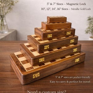 May include: A stack of wooden chess or backgammon game boxes in various sizes. The boxes are brown with a light wood checkerboard pattern on the top and gold-colored clasps. Text on the image indicates size options and locking systems.