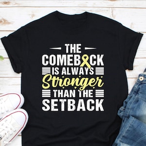 Geel shirt voor sarcoombotkanker, de comeback is altijd sterker dan de tegenslag, shirt geel lint. Overlevende van sarcoomkanker