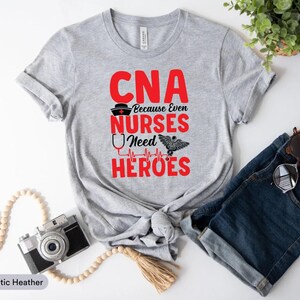CNA Because Even Nurses Need Heroes Shirt, CNA Shirt, Nurse Appreciation Shirt, Nurse Gift Idea, Nurse Week Shirt, Certified Nurse Assistant