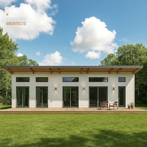 Op de afbeelding: Een moderne, gelijkvloerse woning met een witte gevel, grote glazen deuren en een houten terras. Het huis heeft een plat dak met zichtbare houten balken. Het gazon is groen en de lucht is blauw met wolken. De tekst "KONIKKOS ARCHITECTS" is zichtbaar.