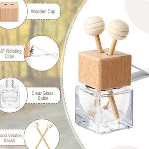 May include: A clear glass bottle with a wooden cap and two wood volatile sticks. The wooden cap is square and has two holes for the sticks. The bottle is designed to be used as an air freshener. The image also shows 360-degree rotating clips.