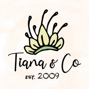 May include: Logo for Tiana & Co, featuring a stylized crown in light green and black. The text "Tiana & Co" is written in a cursive font, with "EST. 2009" below. The background has a soft, watercolor-like effect.
