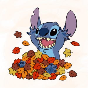 May include: A blue cartoon character with large ears and a wide, open-mouthed expression, emerging from a large pile of colorful autumn leaves in shades of red, orange, and yellow. The character has raised arms and visible blue paw pads.