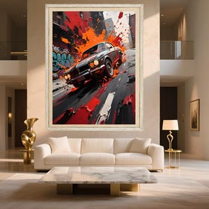 May include: Abstract art print of a black car speeding down a city street. The artwork features bold strokes of red, orange, and black, with a touch of graffiti. The framed print is displayed in a modern living room.