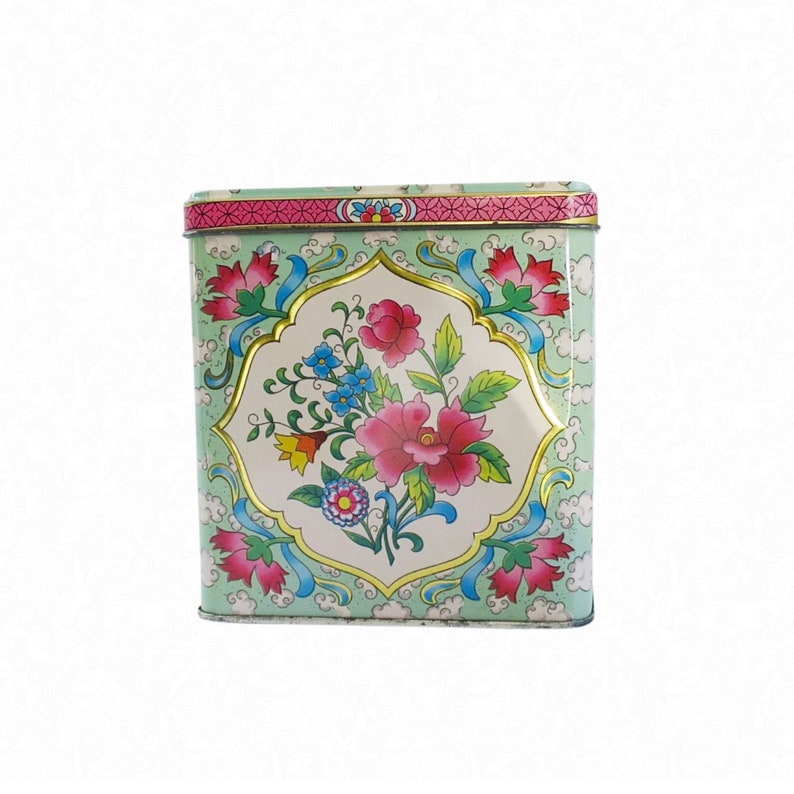 Daher vintage floral pattern storage tin, approximately 4 inches high with hinged lid. Perfect Gift for vintage collectors or farmhouse kitchen decor.  More vintage gifts and supplies at swirlingorange11