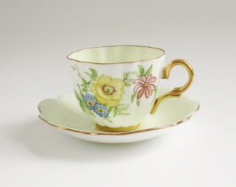 Vintage English Tea Cup and Saucer by Kent, Floral Foreground on a Chiffon Green Background