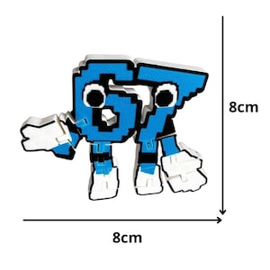May include: A blue and white pixelated figure of the numbers 67, with black eyes and white hands and feet. The figure is 8cm tall and 8cm wide.