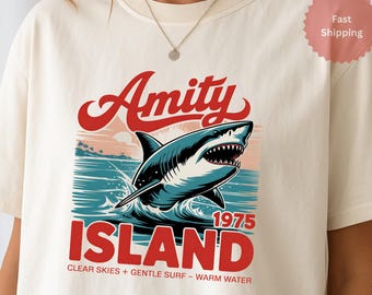 ジョーズ アミティアイランドTシャツ：レトロビーチスリラー、シャークウィークシャツ