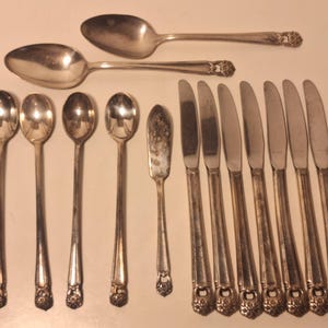 1847 Rogers Bros Eternally Yours silver plated spoons and knives 18 pieces