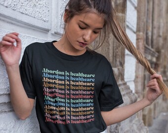 Koszulka „Aborcja to opieka zdrowotna”, koszulka „Pro Choice” dla obu płci, „Protect Roe”, „Prawa do aborcji”, „Abortion Act”, „Prezent feministyczny”, „Wolność reprodukcyjna”
