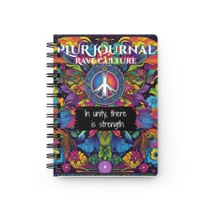 May include: Spiral-bound notebook with a vibrant cover featuring the text "PLUR JOURNAL RAVE CULTURE." The design includes a peace sign, floral patterns, and the phrase "In unity, there is strength." The color palette is a mix of blues, purples, greens, and oranges.