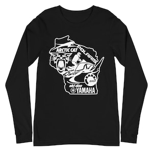 May include: Black long-sleeve shirt featuring a white graphic of a snowmobile and the outline of a state. The graphic includes the text "ARCTIC CAT", "POLARIS", "ski-doo", "YAMAHA", and "BRP".