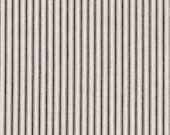 May include: Cream-colored fabric with vertical black stripes. The stripes are evenly spaced and run the entire length of the fabric, creating a classic ticking stripe pattern. The fabric has a slightly textured appearance.