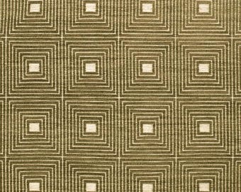May include: Close-up of a fabric with a repeating geometric pattern. The design features squares within squares, creating a grid-like structure. The color palette consists of olive green and off-white, offering a textured appearance.