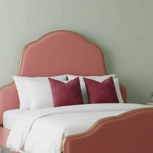 Textured Maroon Pillows on a pink bed with white bedding