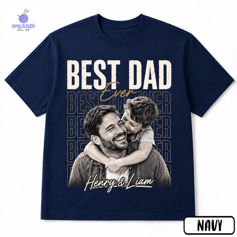 A navy blue t-shirt with a graphic design featuring a smiling father embracing his son.