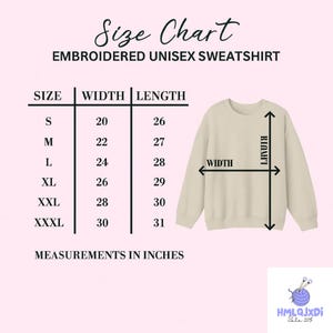 The image is a size chart for an embroidered unisex sweatshirt. It provides measurements for different sizes, including S, M, L, XL, XXL, and XXXL, along with corresponding widths and lengths. The chart also includes a diagram of the sweatshirt to visually represent the measurements.
