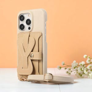 Custodia a tracolla in pelle per iPhone: scomparti per carte, porta cinturino da polso, tracolla lunga